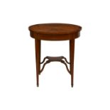 A fine Edwardian mahogany and silkwood crossbanded occasional table, the circular top with central