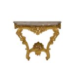 A Louis XV style carved giltwood console table, the mottled red, grey and white marble top with