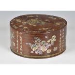 A Chinese mother of pearl inlaid hardwood jewellery or sewing box, 19th century, of circular form,