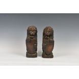 A pair of finely carved oak heraldic lion finials / newel post tops, 19th century or earlier, carved