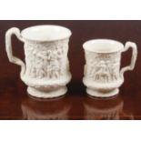 Charles Meigh - two white porcelain tankards with vine handles , 19th century, bisque glaze to