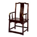 A Chinese carved hardwood continuous yoke back arm chair, Qing Dynasty, probably 19th century,