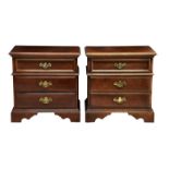 A pair of Bernhardt American late 18th century style bedside chests, the moulded rectangular top