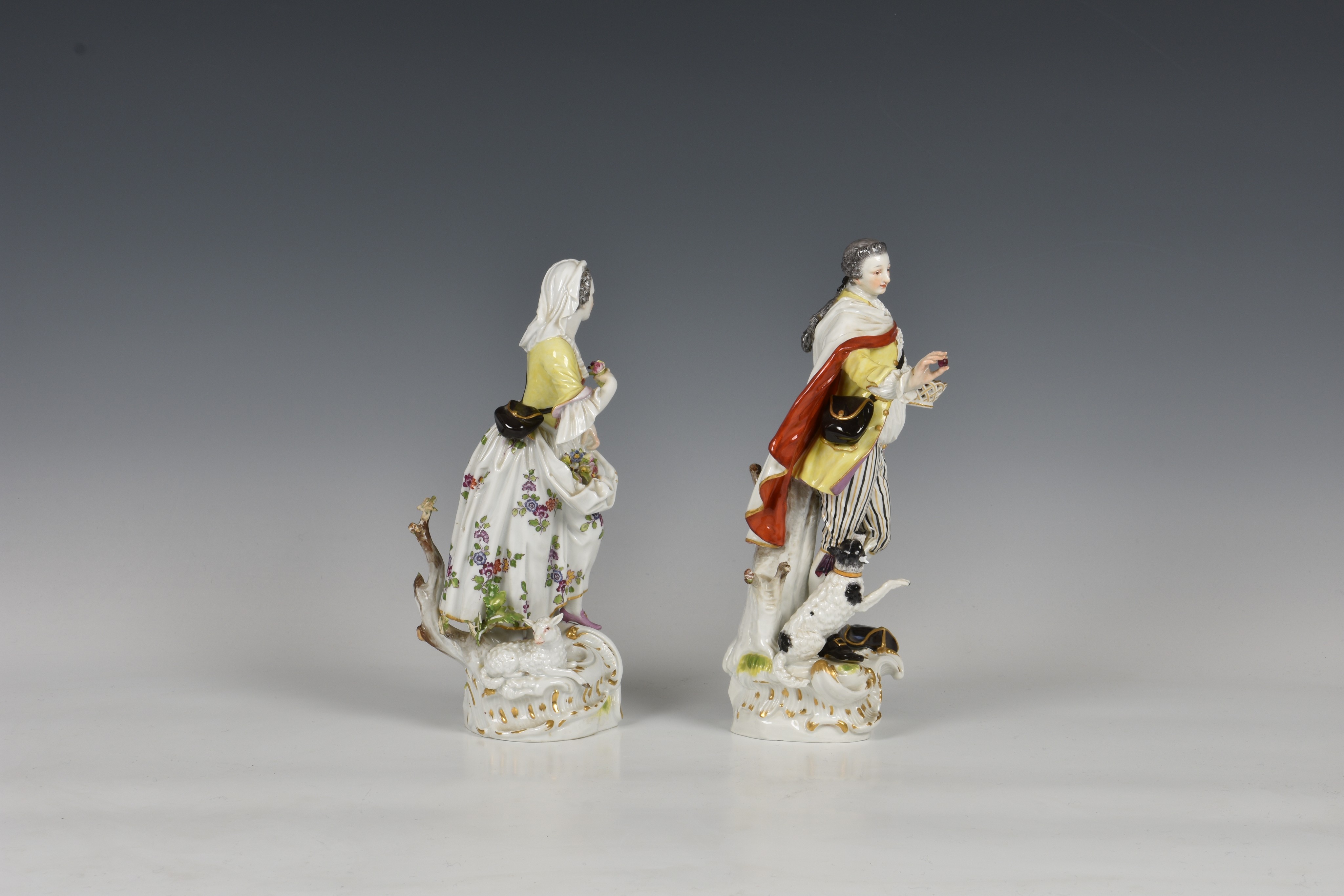 A pair of Meissen figures of a gallant and his companion, early 20th century, the man holding a - Image 2 of 8
