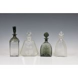 A large Art Deco style perfume bottle, of faceted triangular form with frosted glass stylised