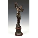 A French fin de siècle bronzed spelter figure, of a winged female with butterfly wings playing the