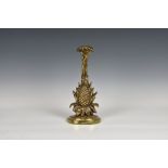 A 19th Century lead weighted brass doorstop in the form of a pineapple, 13 7/8in. (35.4cm.) high.