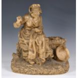 after E. Quinter - The Seamstress, a buff glazed terracotta figure, late 19th / early 20th