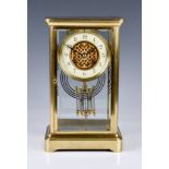 A French four glass brass cased mantel clock, early 20th century, the eight day movement with