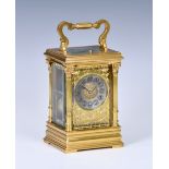 A large French gilt brass carriage clock with repeat, late 19th century, with Corinthian column