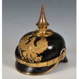A First World War style German /Prussian pickelhaube, leather bodied shell, gilt brass Prussian
