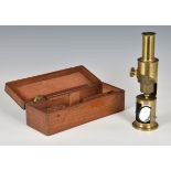 A cased late Victorian brass monocular microscope, unmarked, 9¼in. (23.5cm.) high, in fitted
