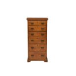 A c.1900 mid oak tall chest of drawers, the rectangular top over six graduated drawers with shaped