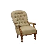 A Victorian spoon back chair with buttoned silk upholstery, the buttoned back to a serpentine