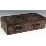 A Chinese carved teak document/writing box with iron furniture, probably 19th century, the two