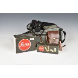 A Leica R5 camera outfit, black, serial no. 1716257, with original box and strap; together with a