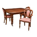 A Victorian style mahogany extending dining table and eight cloud back chairs, by Simbek Furniture