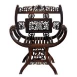 A Chinese carved hardwood ram's horn arm chair, probably late 19th century, the back with a