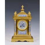 A late 19th century French gilt brass mantel clock in the Aesthetic Movement manner by Achille