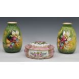 A pair of Royal Bonn pottery vases, Germany, decorated with painted images of spring flowers; signed