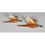 A pair of Beswick Flying Pheasant wall plaques, 20th century, numbered 661/2 & 661/3. (2)