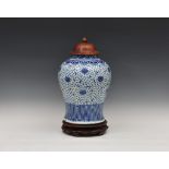 A Chinese porcelain blue and white 'lotus scroll' vase, Qing dynasty, possibly Jiaqing period (