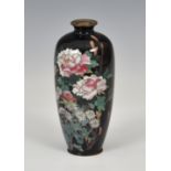 A small Japanese cloisonné enamel black ground vase, Meiji period (1868-1912), decorated with a