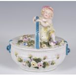 French white porcelain lidded basket, encrusted with coloured flowers and figure of a young girl