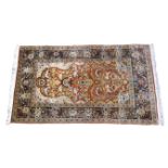 An Imperial Jewel Herati style silk rug, the Herati pattern main field with foliate spandrels
