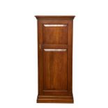 A late 19th / early 20th century mahogany side cabinet, the stepped top over a single two panel door