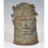 A bronze Benin Memorial Head, Probably 20th century, West Africa (Nigeria), having wide open eyes