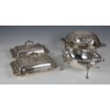 A pair of silver plated covered entree dishes, with foliate reeded borders and detachable, foliate
