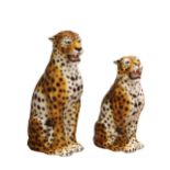 A graduated pair of large pottery leopards by 'Ceramiche Boxer' of Italy, retailed by Dogwood