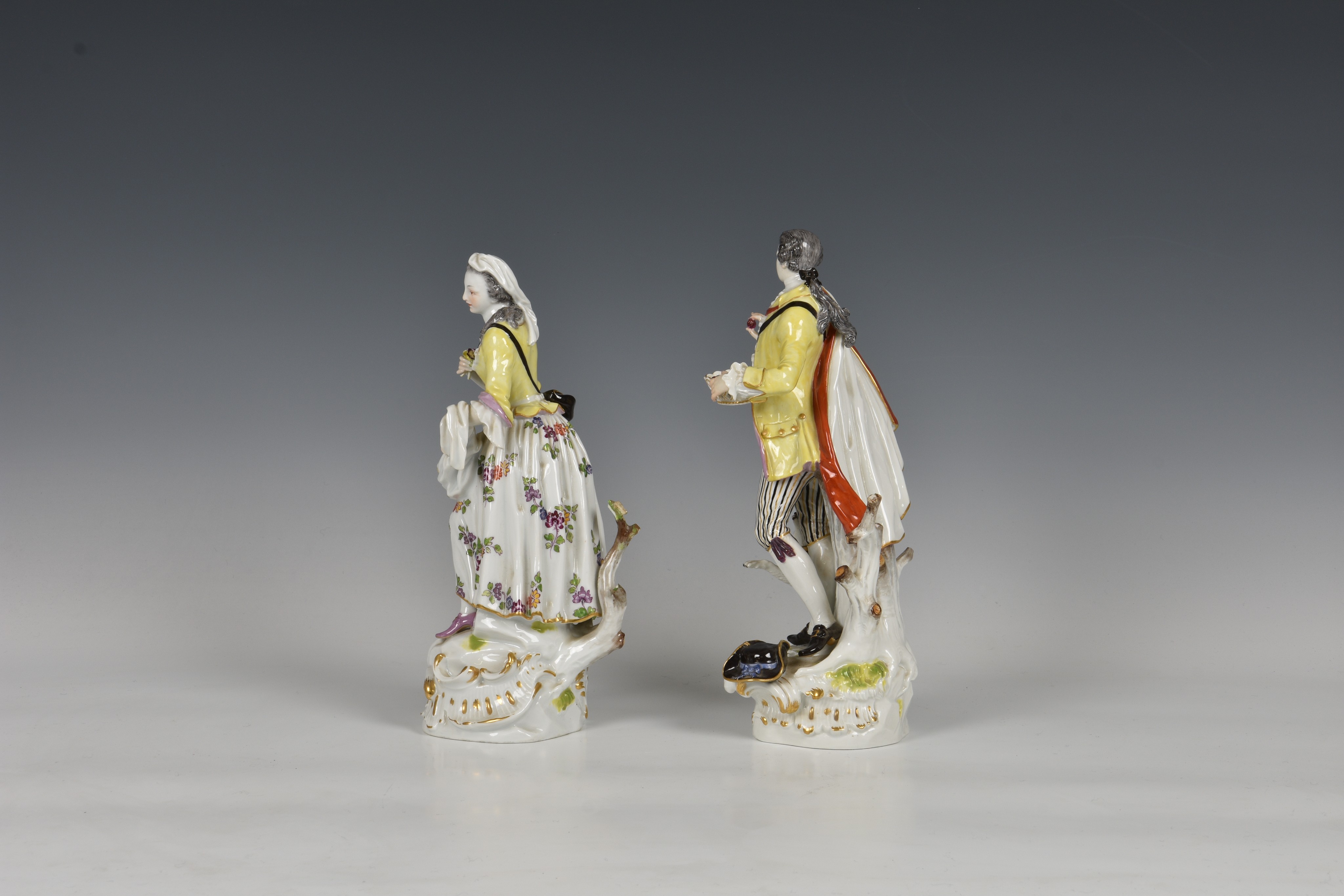 A pair of Meissen figures of a gallant and his companion, early 20th century, the man holding a - Image 3 of 8