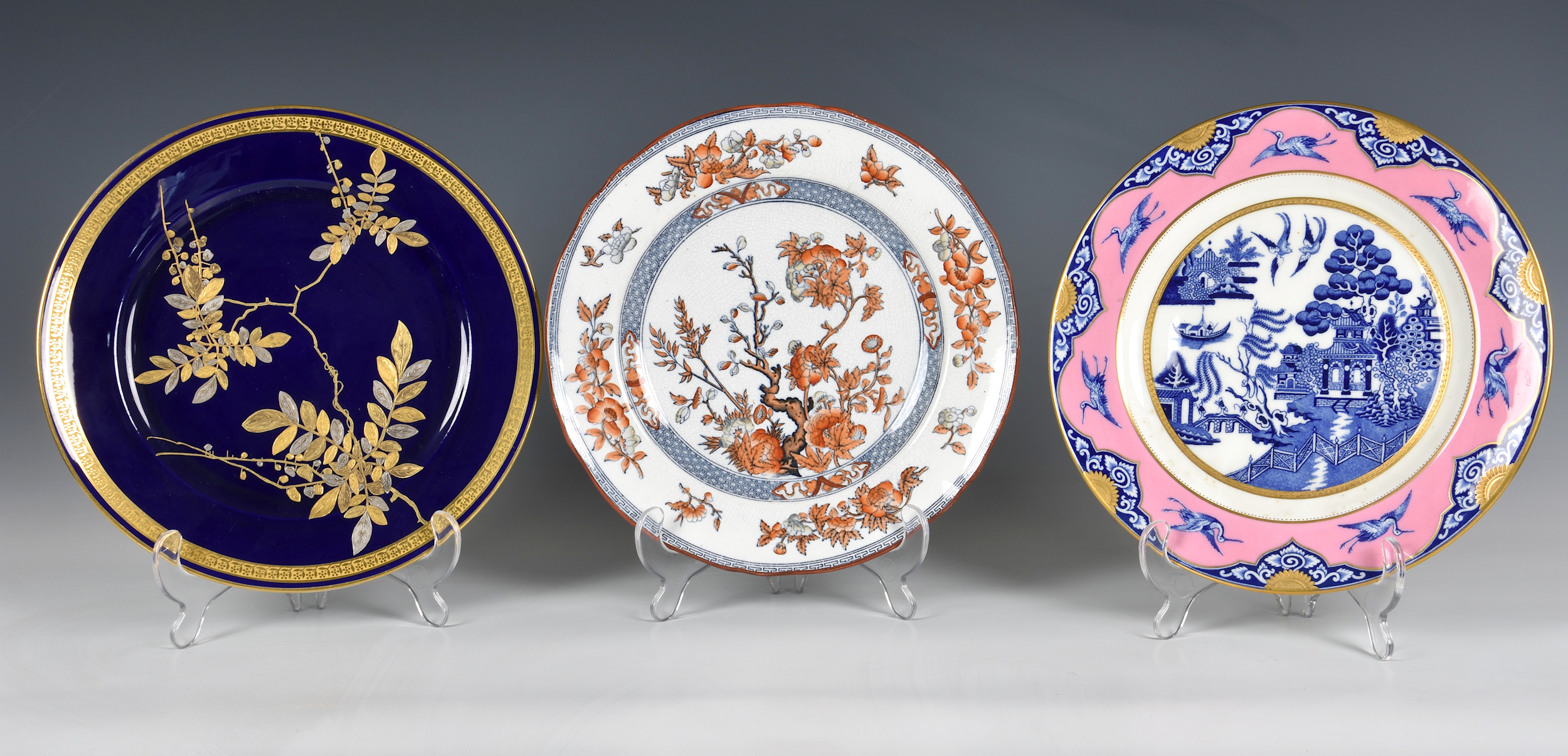 A group of 19th century decorative plates, including a pair of blue and white transferware plates