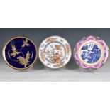 A group of 19th century decorative plates, including a pair of blue and white transferware plates