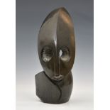 Ashmael Kapeta - a carved serpentine sculpture, 'Abstract Head', signed to reverse, 16in. (40.