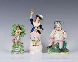A Walton Staffordshire pearlware bocage figure, with a pastoral theme which features a girl