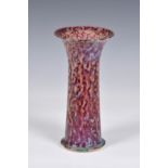 A Ruskin Pottery high fired Lily Vase, 1925, stoneware, the glaze in mottled tones of grey, red