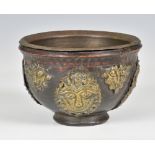 A carved coconut shell and brass bowl, possibly Indonesian, probably early 20th century, the