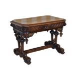 A Victorian carved oak octagonal centre table, the moulded top carved with foliage to the border,