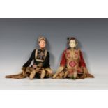 Two antique Chinese opera dolls, carved wood with painted gesso features, probably early 20th