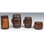Two miniature coopered oak barrels, 9½in. (24.1cm.) and 7¼in. (18.4cm.) long; together with two iron