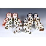 Five pairs of Staffordshire dogs, each pair with traditional embellishments, chain and separated