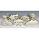 A 19th century Wedgwood style creamware part dessert service, comprising a navette shaped dish,10
