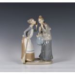 A large Lladro figurine 'The Gossip', two ladies modelled standing, printed and stamped marks, 12in.