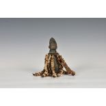 Tribal Art - A Yoruba Eshu figure, Nigeria, West Africa, 19th/20th century, the simple robed