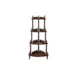 A Victorian mahogany four tier whatnot, with acanthus carved galleries, on turned pillars and legs