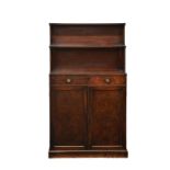 A Regency mahogany chiffonier, with two stepped shelves on turned column supports over a rectangular