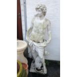 A large painted composite stone garden statue, of a classical archer, a dog at his feet, 54in. (